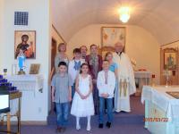 Neepawa and Minnedosa parishes - March 2015: Two of six children receiving their First Solemn Holy Communion.